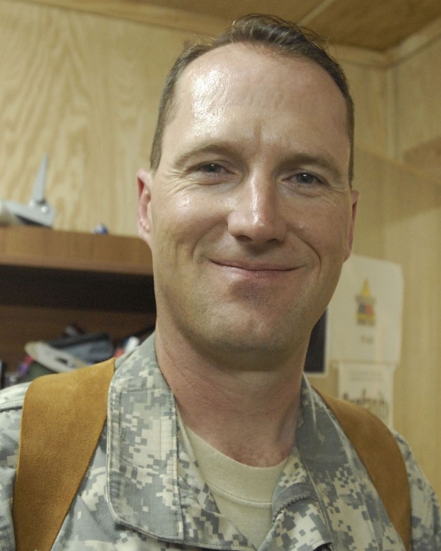 BAGHDAD - Sgt. 1st Class Donald Johnson, the electronic warfare officer of the 2nd Brigade Combat Team, 1st Armored Division, Multi-National Division-Baghdad, Sept. 15, 2008.  Johnson, from Barron, Wis., began his Army career 22 years ago with the in...