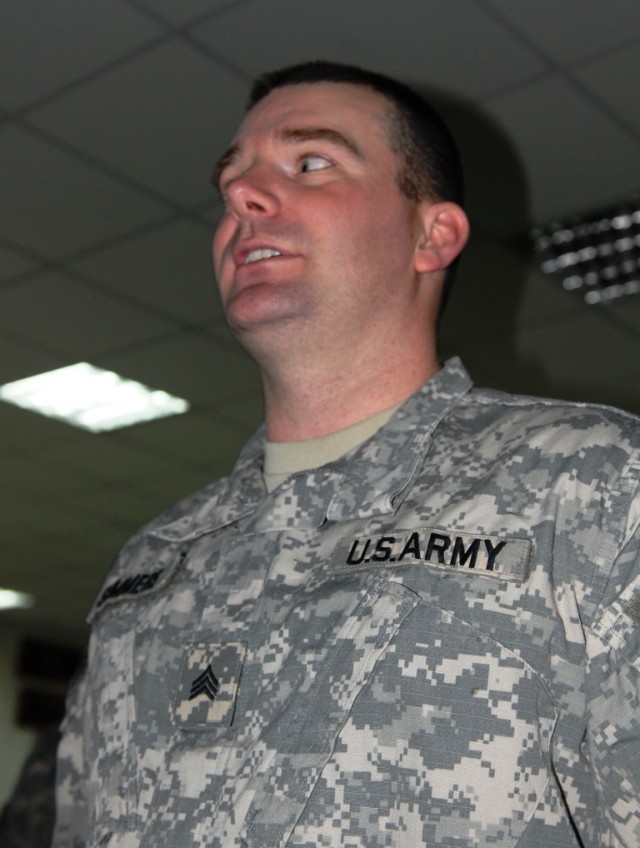 BAGHDAD - Sgt. Jason Summers, a Texas Army National Guard Soldier serving in Headquarters and Headquarters Company, 56th Infantry Brigade Combat Team, 36th Infantry Division, recites the Non-Commissioned Officer's Creed after being promoted during...