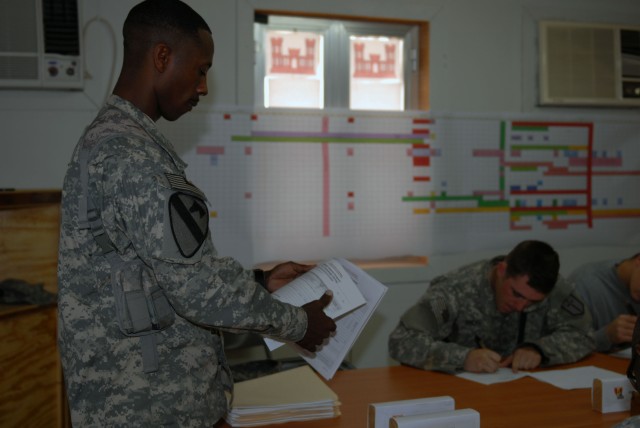 BAGHDAD -  Sgt. 1st Class Jamie Walls, of Killeen, Texas, a representative of the Army Test and Evaluation Command out of Fort Hood, Texas speaks to Soldiers from the 46th Engineer Battalion, 225th Engineer Brigade, Feb. 23 about filling out...