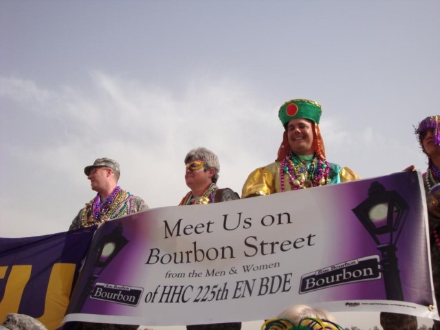 CAMP LIBERTY, Iraq - Members of the Louisiana National Guard's 225th Engineer Brigade  celebrate Mardi-Gras in style by dressing up in the traditional holiday attire of colored beads and masks while showing off their Louisiana state pride Feb. 24....