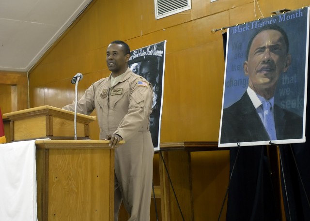 BAGHDAD – Maj. Kingston Lampley, a native of Newark, N.J., air advisor to the Iraqi Air Force Air Operations Center, address the audience of the “African-American/Black History Month” Observance at Camp Liberty Feb. 22. Lampley, who was the...