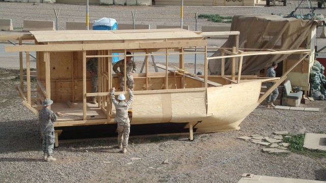 Soldiers and Airmen build ship-like guard shack to bring the sea life to land