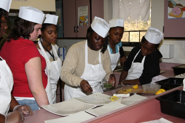 Fort Bragg Soldiers teach students how to cook