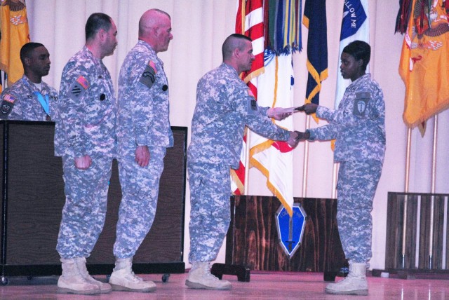 Soldier receives signed NCO Creed during Fort Benning Year of the NCO Kickoff Ceremony