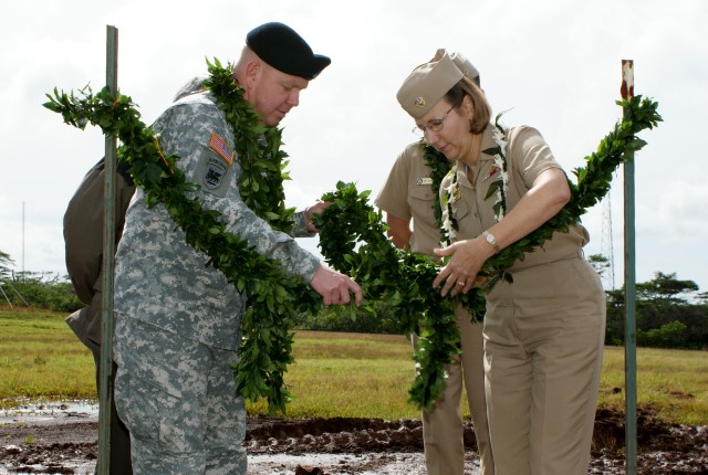 Untieing the maile lei