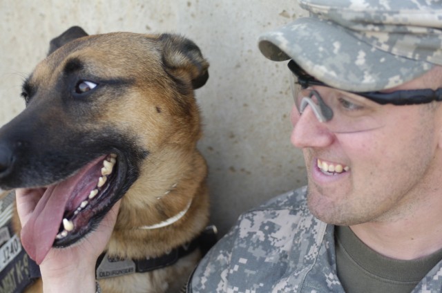 Air Force Staff Sgt. Joel Townsend and his partner, Sgt. 1st Class A-Taq, a two-year-old Belgian Malinois, have racked up numerous mission hours during their 13 months in Iraq. Townsend says A-Taq provides an invaluable service to the Soldiers he...