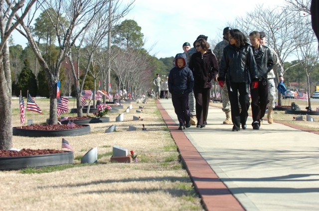 Family and Friends Honor Fallen Soldiers at Warriors Walk