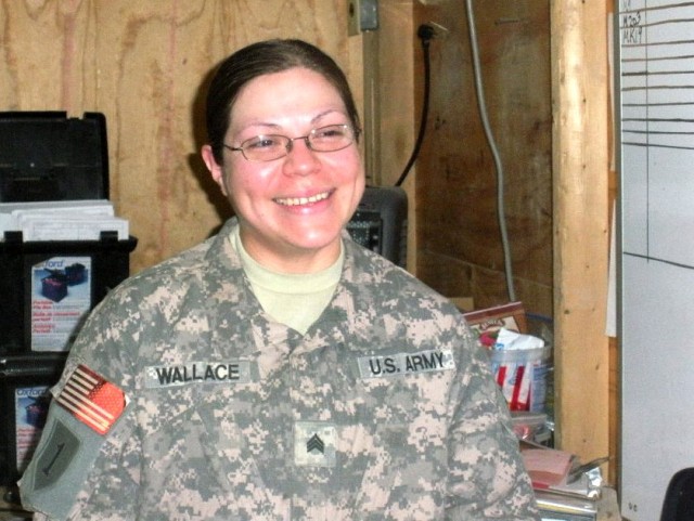 BAGHDAD- Lubbock, Texas native Sgt. Christine Wallace, non-commissioned officer in charge of the small-arms repair shop of the 1st Combined Arms "Dragons" Battalion, 63rd Armor Regiment, currently attached to the 2nd Brigade Combat Team, 1st...