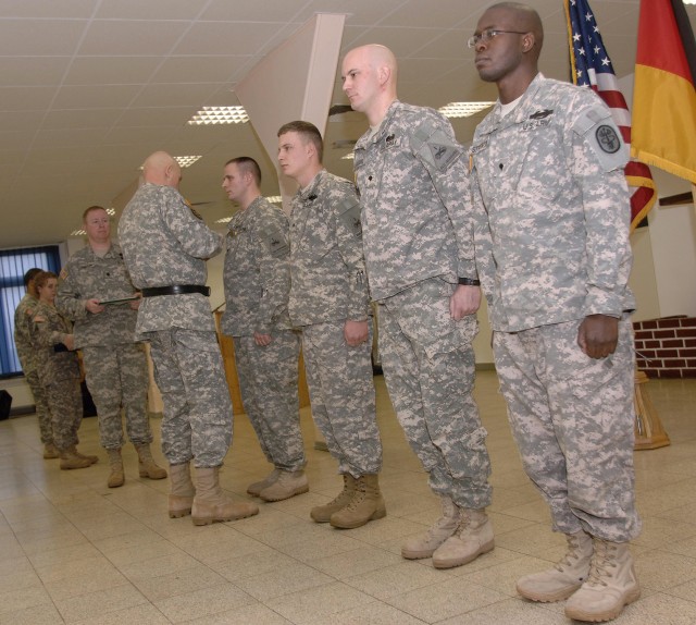 1st Armored Division Soldiers receive medals for valor in Iraq during Baumholder ceremony