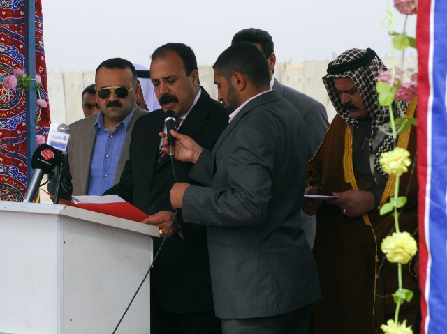 BAGHDAD - Sheik Ayad speaks to local Sheiks, members of the Radwaniyah Farmer's Association and Soldiers from the 1st Combined Arms Battalion, 63rd Armored Regiment during a ceremony in Radwaniyah March 6 in which 20 tractors were donated for use...