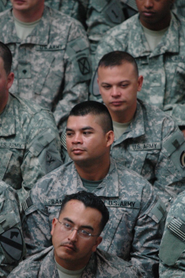BAGHDAD - Sgt. Juan Ramos (second from the bottom), an armor crewman with Headquarters and Headquarters Company, 1st Combined Arms Battalion, 18th Infantry Regiment, 2nd Heavy Brigade Combat Team, 1st Infantry Division, Multi-National Division -...