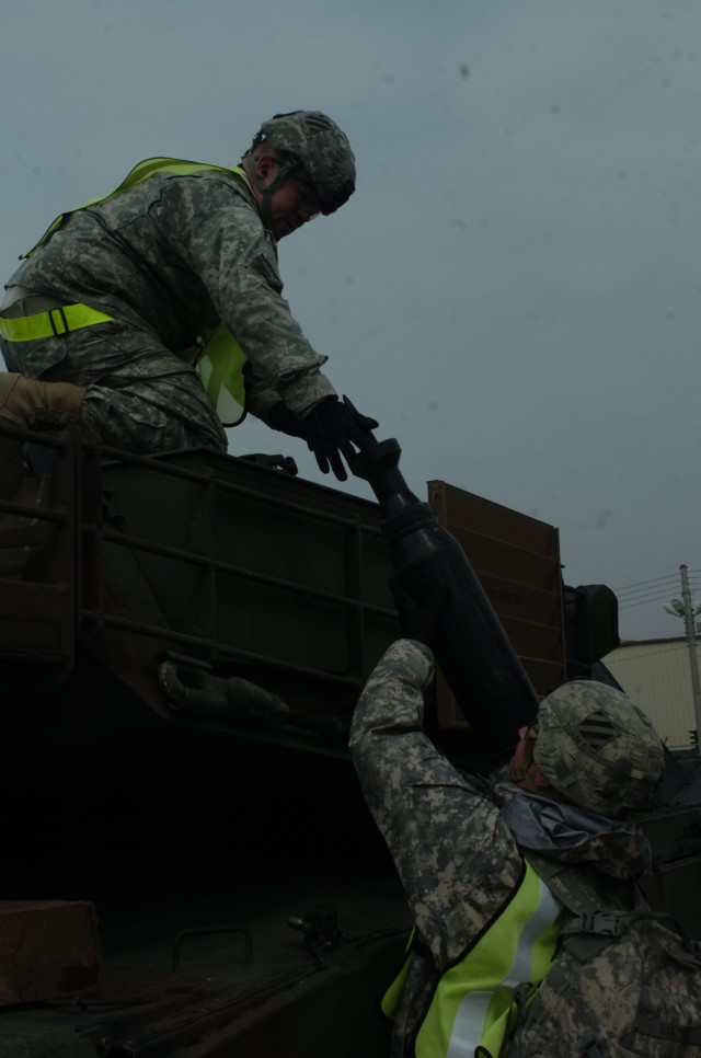 1/64 Armor Loads Ammo During Training