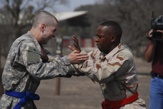 Soliders prepare to battle during combatives tournament
