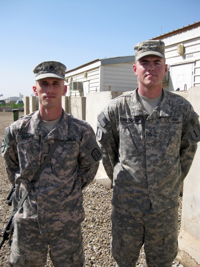 CAMP LIBERTY, Iraq - Sgt. 1st Class Ronald Burke (left), from Pearland, Texas, assigned to 211th Mobile Public Affairs Detachment, 1st Cavalry Division, reunites with his former middle school student, Pfc. Johnny Cunningham, a native of Houston,...