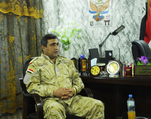 BAGHDAD - Staff Col. Akrram Saddam, commander,  23rd Brigade, 17th Iraqi Army Division discusses combined military operations in southern Baghdad during a visit by  Brig. Gen. Frederick Rudesheim, deputy commanding general for support, 1st Cavalry...