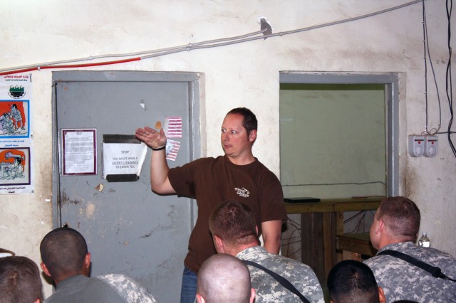 Steve Mazan, a comedian with the 'Comics Ready to Entertain' tour, performs for Soldiers assigned to the 4th Brigade Combat Team, 1st Cavalry Division, during their first Morale, Welfare and Recreation event at the remote military installation of...