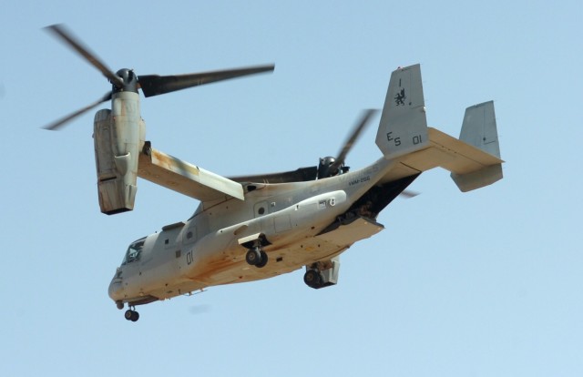CAMP LIBERTY, Iraq - Carrying Marines, an MV-22B Osprey, tilt-rotor aircraft approaches for a landing at Liberty Command Pad on Camp Liberty March 19. Ospreys were officially approved for military service in 2005, after 16 years of development,...