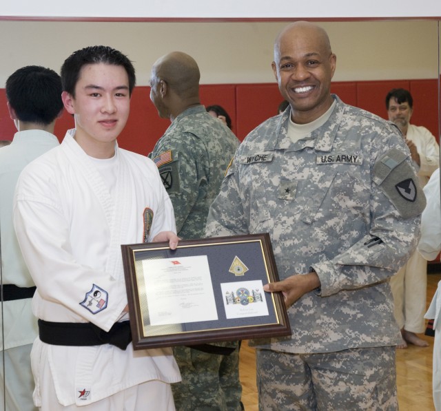 Acting JM&amp;L LCMC commanding general honors Randolph student for earning his karate black belt