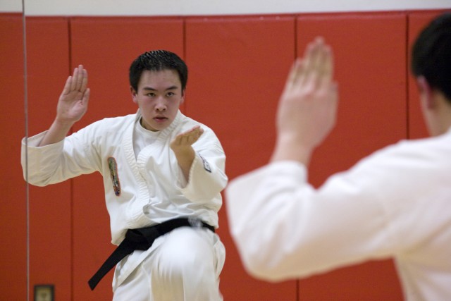 Acting JM&amp;L LCMC commanding general honors Randolph student for earning his karate black belt