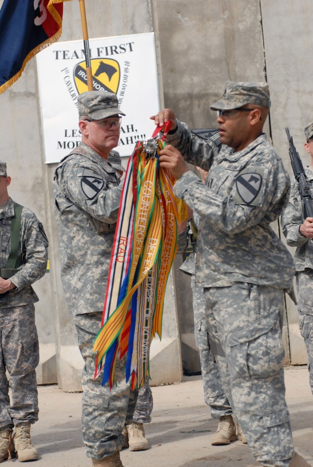 CAMP WAR EAGLE, Iraq - Sioux Falls, S.D. native, Col. Tobin Green (left), commander of the 1st "Ironhorse" Brigade Combat Team, 1st Cavalry Division and Compton, Calif. Native, Command Sergeant Major James Norman (right), senior noncommissioned...