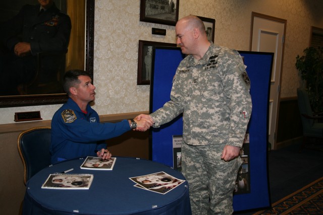 Kimbrough signs autographs