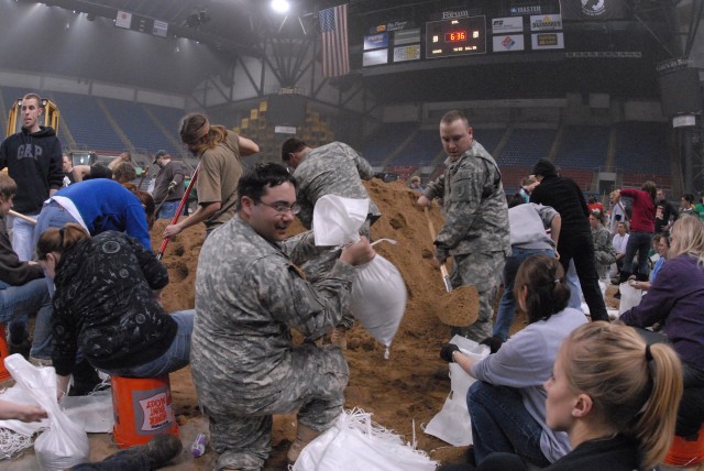 Soldiers work with civilians to save Fargo