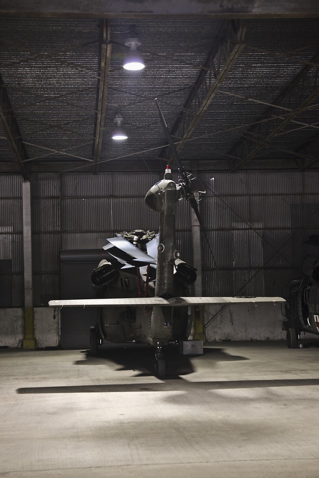 A UH-60 Black Hawk helicopter from the 1st Air Cavalry Brigade, 1st Cavalry Division, sits prepped and ready to be loaded onto a vessel at the Port of Beaumont, Texas, March 17.  The aircraft will be shipped to Kuwait for the 1st ACB to support...