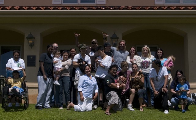 Television celebrities visit Fisher House before basketball game