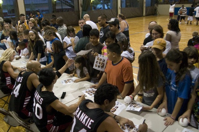 Hollywood Knights: Stars shoot hoops with troops