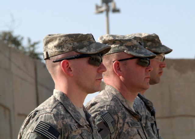 BAGHDAD - From left to right: Capt. Aaron Lummer, a native of Camp Point, Ill., former commander, Headquarters and Headquarters Company, 1st Combined Arms Battalion, 18th Infantry Regiment; Lt. Col. John Vermeesch, a native of Marshall, Mich., comman...