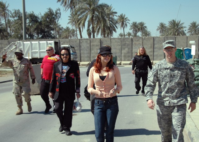 BAGHDAD - Greensburg, Pa. native, 1st Lt. Matthew Lenart (right) of the 1st Combined Arms "Vanguard" Battalion, 18th Infantry Regiment walks with "SoCal Val," Jimmy Heart, Brian "Nasty Boy" Knobs and Greg "the Hammer" Valentine of  the "Legends of...