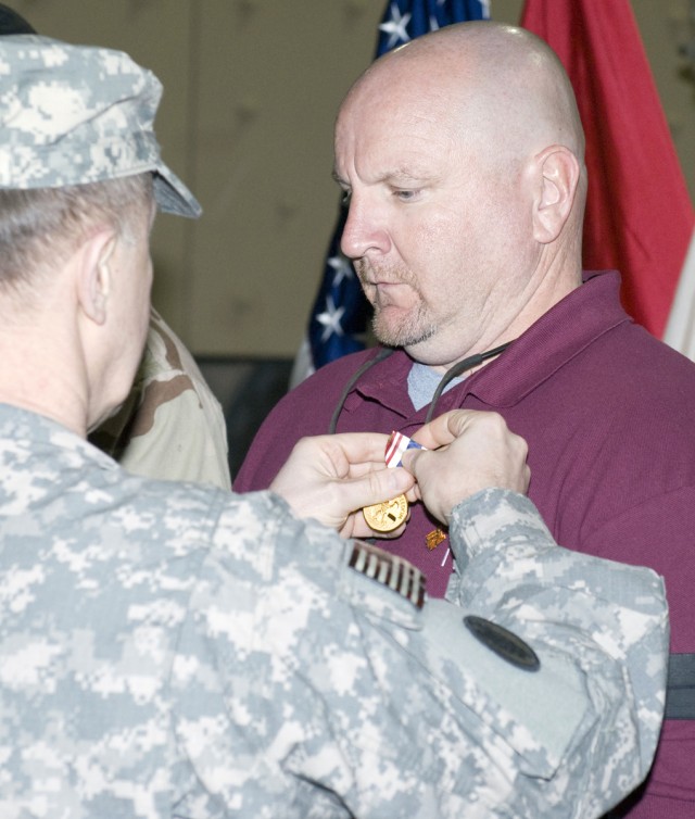Christopher Kirby receives Defense of Freedom Medal