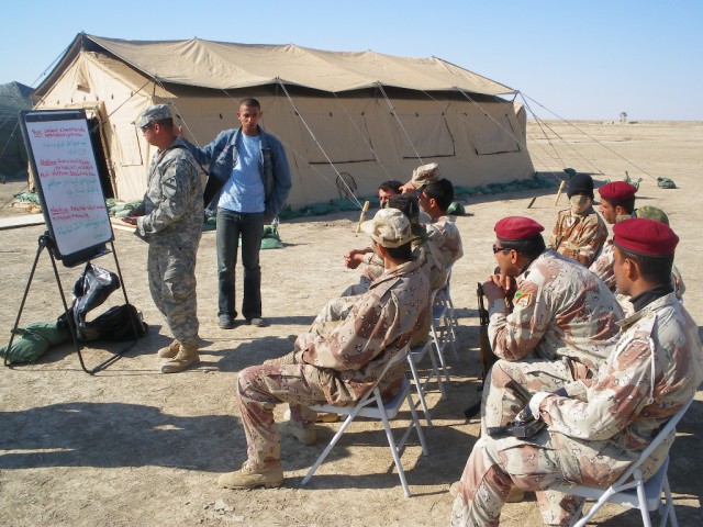 Sgt. Chris Hererra, assigned to 2nd Battalion, 12th Cavalry Regiment, 4th Brigade Combat Team, 1st Cavalry Division, instructs troops from the 3rd Battalion, 40th Iraqi Army Brigade on sensitive site exploitation operations during a three-day...