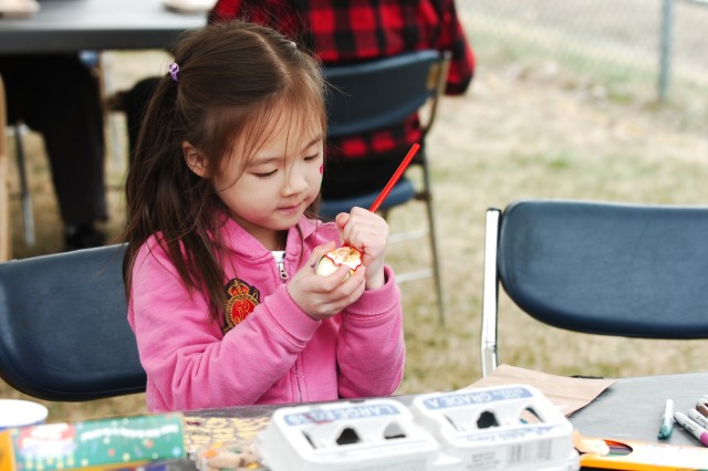 Egg coloring for one Iron Brigade family member