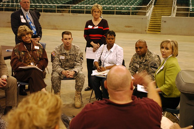 1st Cavalry Division and Central Texas high school reps met March 31, at the Bell County Expo Center, Belton, Texas, to discuss coordination plans for the upcoming graduation ceremonies to be shown throughout selected bases in Iraq, Afghanistan and K...