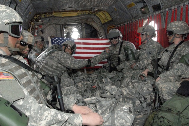 Army couple flies high to re-enlist