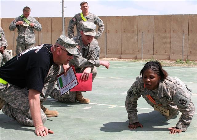 Female Soldier pushes herself and others