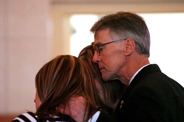 Ronnie Moody, consoles his daughters, Alyson and Ashley, as friends and family members gathered to honor their son and brother, Pvt. Samuel Moody, a cavalry scout assigned to 6th Squadron, 9th Cavalry Regiment, 3rd Heavy Brigade Combat Team, 1st...