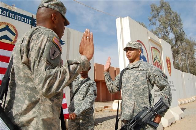 Personnel sergeant re-enlists during the Year of NCO