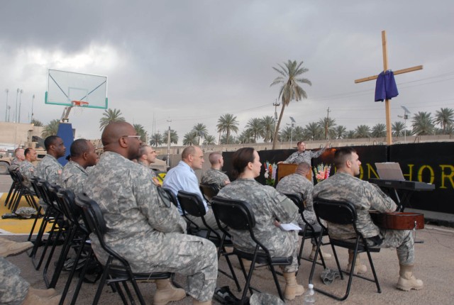 BAGHDAD - Soldiers from the 1st "Ironhorse" Brigade Combat Team, 1st Cavalry Division listen intently as Maj. Mark Johnston, the brigade chaplain, from El Paso, Texas, gives the Easter sermon about grace on Easter Sunday April 12 on Joint Security St...