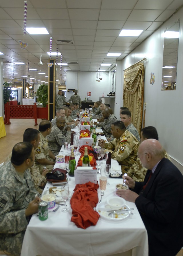 BAGHDAD - Leaders of the 2nd Heavy Brigade Combat Team "Dagger," 1st Infantry Division, Multi National Division - Baghdad, meet with leaders of the 24thBrigade, 6th Iraqi Army Division for dinner at the Dagger Inn Dining Facility on Camp Liberty Apri...