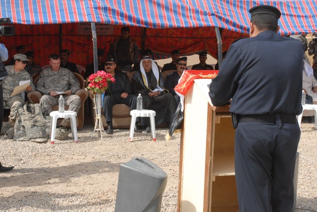 An Iraqi policeman gives a speech at the Zaab Police Station validation ceremony to guests that include Maj. Gen Jamal Tahir Bakir, the Kirkuk province police chief, and Lt. Col. David Lesperance, the commander of 1st Battalion, 8th Cavalry...