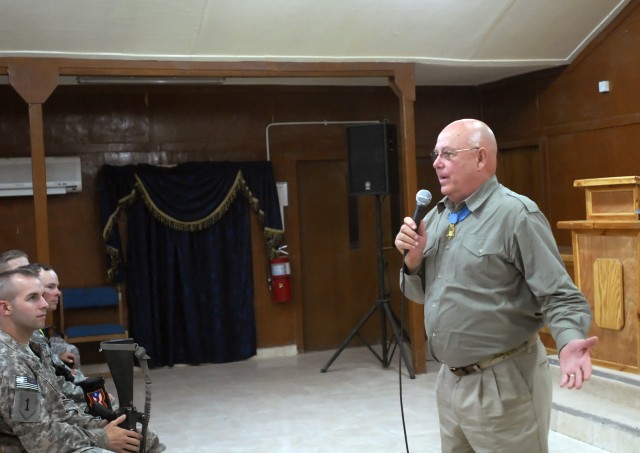 Command Sgt. Maj. (retired) Gary Littrell, who earned the Medal of Honor while in combat in the Vietnam War, speaks to Soldiers serving with the 2nd Heavy Brigade Combat Team, 1st Infantry Division, Multi-National Division - Baghdad, at Warrior Chape...