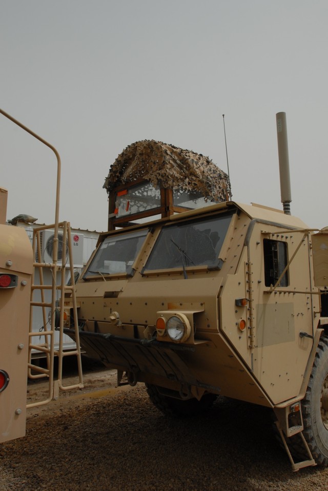 BAGHDAD - The addition of a bullet proof glass cupola is a common site on military vehicles in Iraq. Stryker vehicles, Mine Resistant Ambush Protected vehicles and transport trucks, such as this one on Camp Taji, often sport some type of low cost...