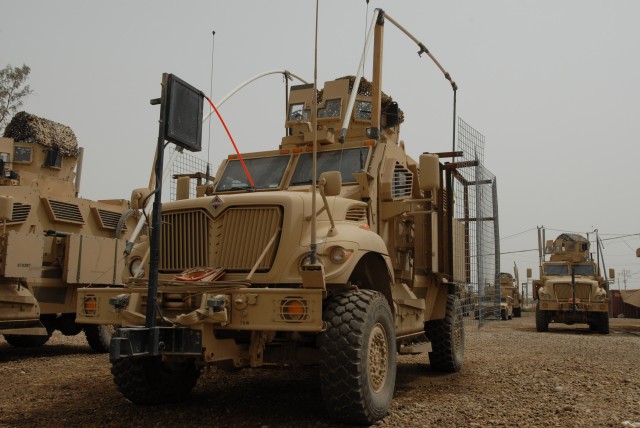 BAGHDAD - A Mine Resistant Ambush Protected vehicle used by the 328th Brigade Support Battalion, 56th Stryker Brigade Combat Team, sports a wire mesh deflector on Camp Taji. The apparatus is bolted onto both sides of the vehicle to give it added prot...