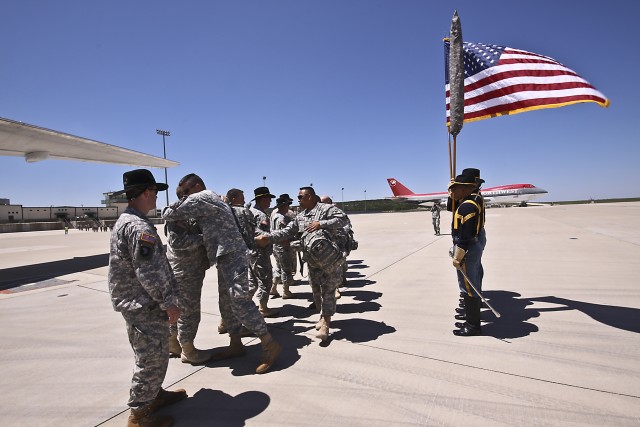 Soldiers of the 1st Air Cavalry Brigade, 1st Cavalry Division, who are deploying to Iraq, are sent off by Canadian Army Brig. Gen. Peter Atkinson, III Corps deputy commanding general, along with leadership of the 1st Air Cav. Bde., and the 1st...