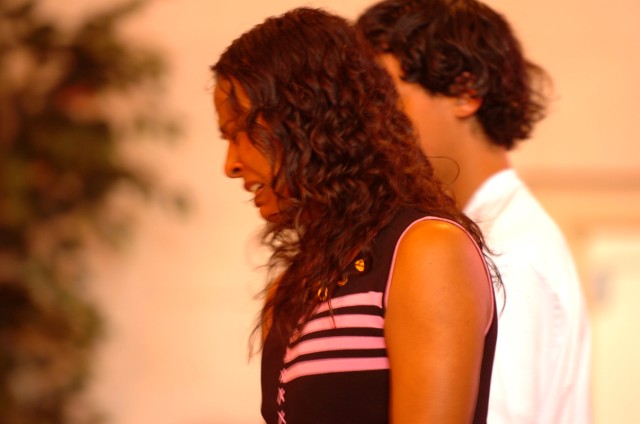 Xiomara and Brandon Mansilla, Spc. Jessica Sarandrea's mother and brother, spend a moment in front of Sarandrea's memorial display as hundreds of fellow Soldiers, friends and family members showed up to her memorial service April 16, at the...