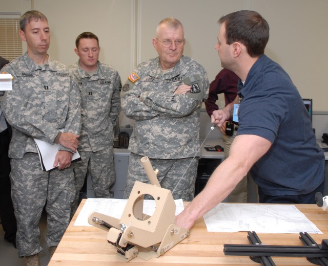 Workers showcase capabilities during visit