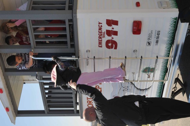 Firefighters use trailer to teach fire safety