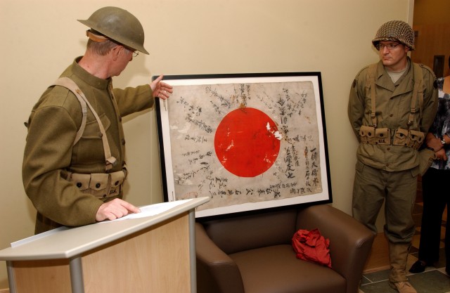 Captured Japanese Yosegaki flag returns to Camp Jackson, 81st Infantry Division during 101st Army Reserve Birthday Celebration